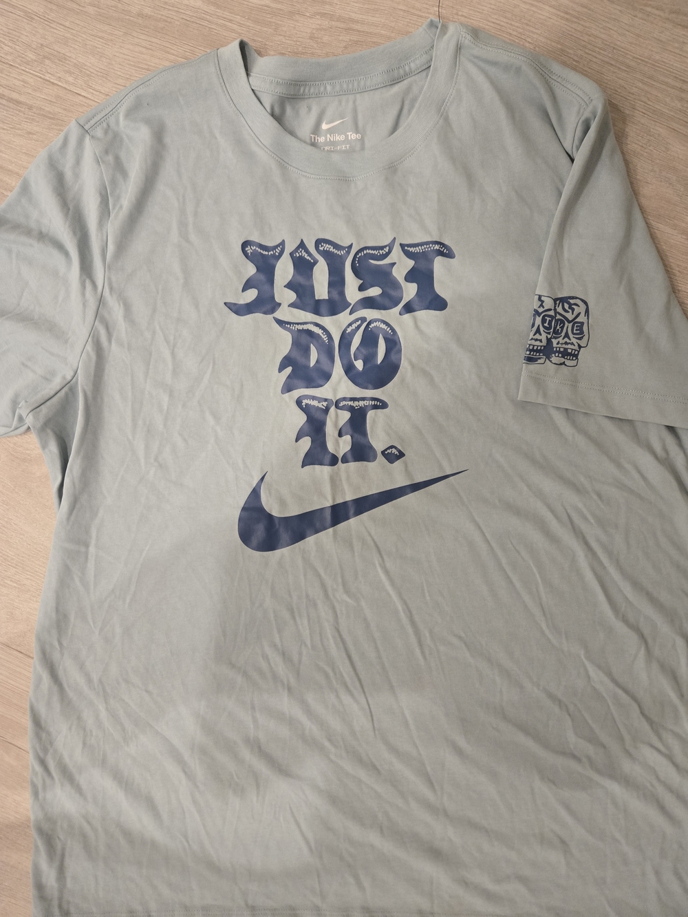 Nike Men's Sage Green 'Just Do It' Graphic Tee with Navy Swoosh